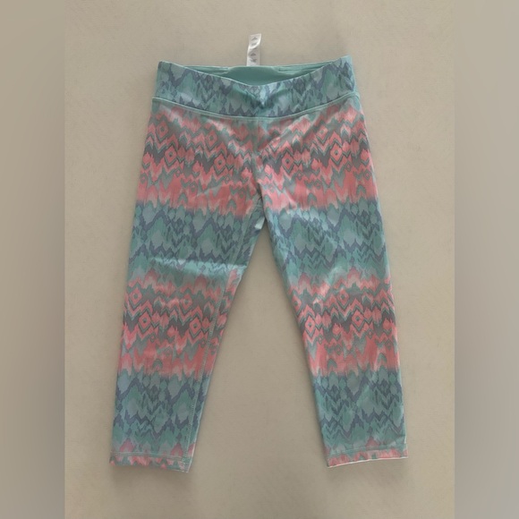 Ivivva by Lululemon Coral and Teal Patterned Kids Leggings - Picture 1 of 10